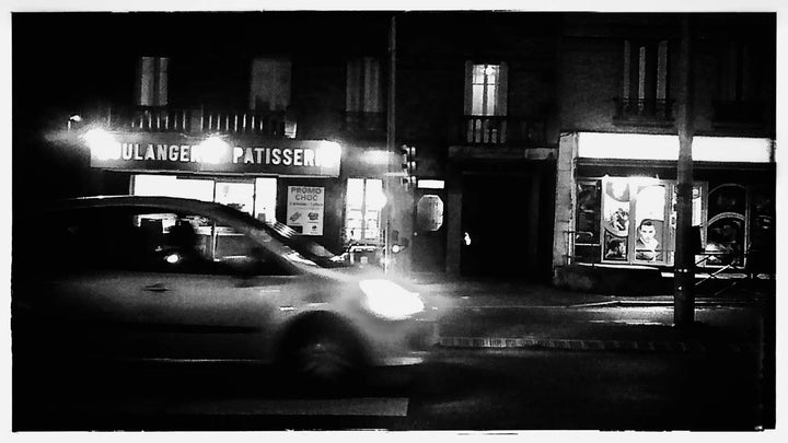 After dark with the black and white filter on. Grainy and soft — it holds the room rather than the detail.
