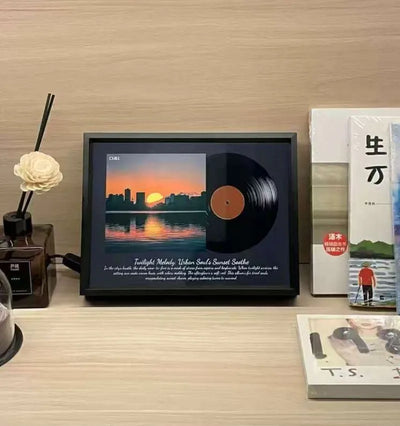DuskFrame on a wooden shelf between books